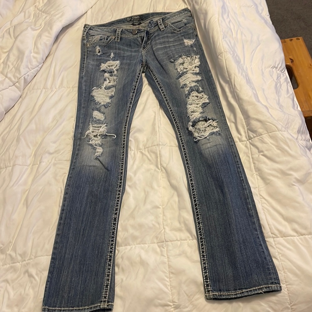 Silver jean, Tuesday straight, distressed with lace backing.